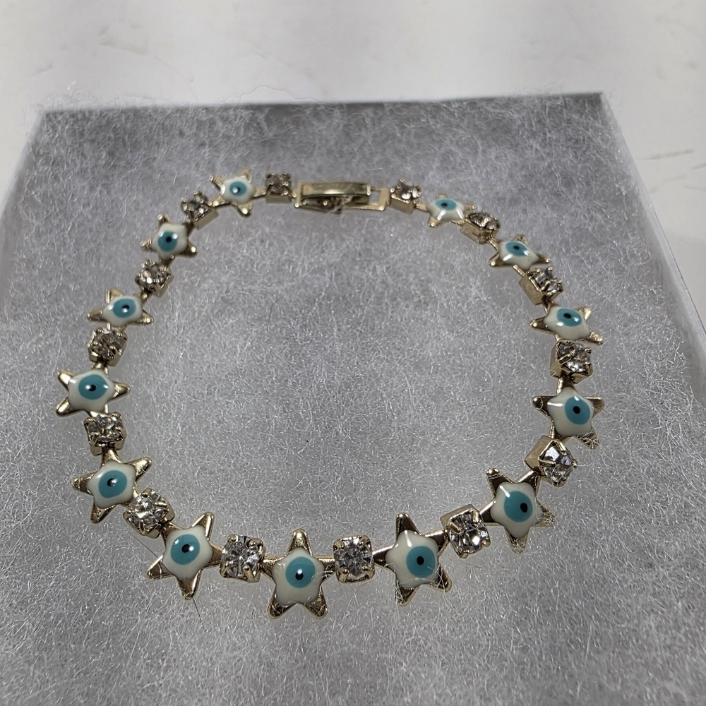 Gold Star and Evil Eye Bracelet With Crystals